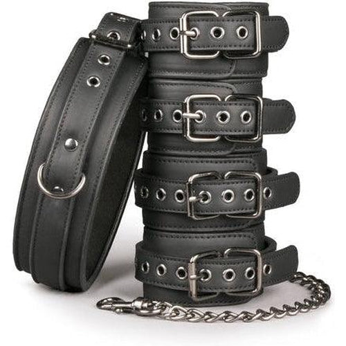 Fetish set with collar, ankle- and wrist cuffs